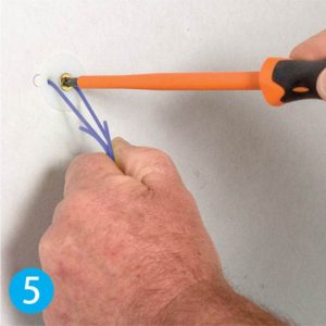 While keeping firm tension on the pullcord, screw the large screw into the center hole until the GeeFix becomes firm, but do not overtighten. Keeping tension on the pullcord will keep the back plate in place during installation.
